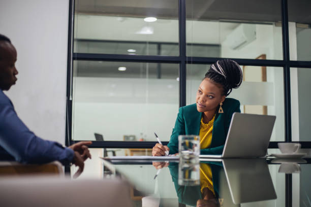 Young man on job interview with female HR manager.